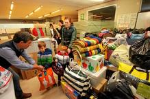 Allau de donacions de roba d'abric per als refugiats