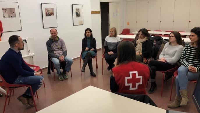 Un grup de 23 persones fan "d'àngels de la guarda" a refugiats a Lleida