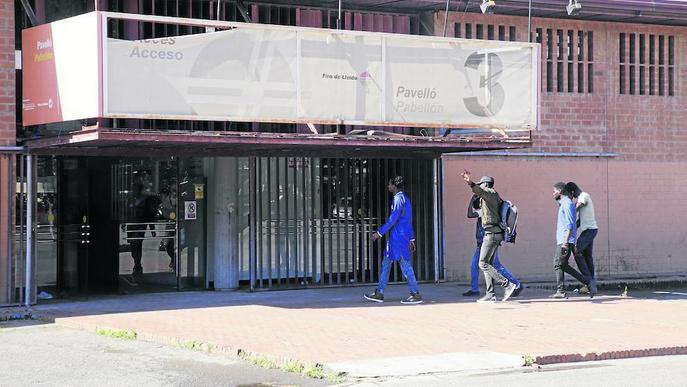 El centre d’atenció a temporers a la Fira obre portes a mig gas