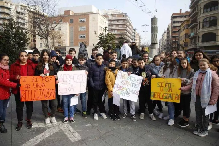 “I si fos un refugiat, també m'abraçaries?”